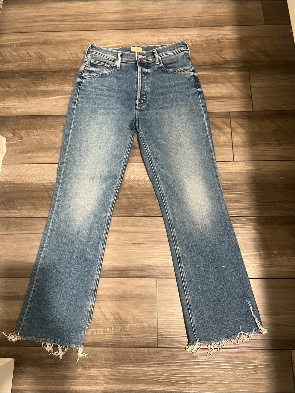 MOTHER Distressed Light Blue Crop Flare Jeans